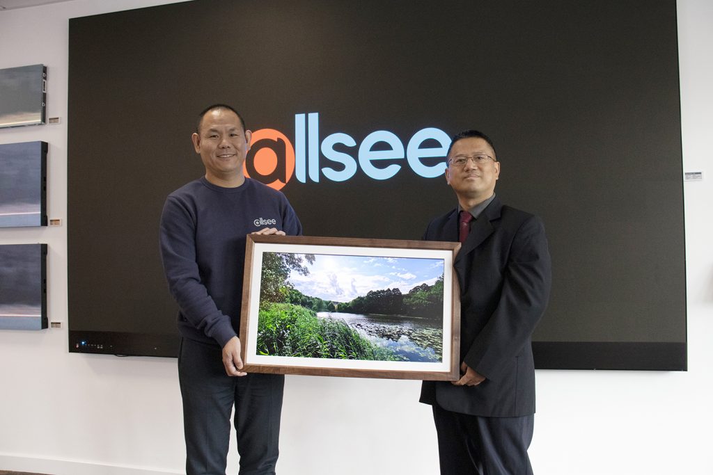 Baoli Zhao and Yangang Xing with Allsee Photo Frame