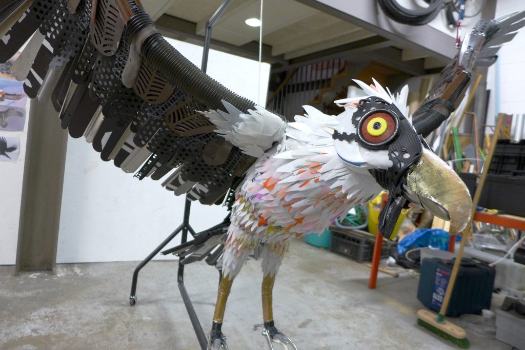 Vulture sculpture made out of recycled materials