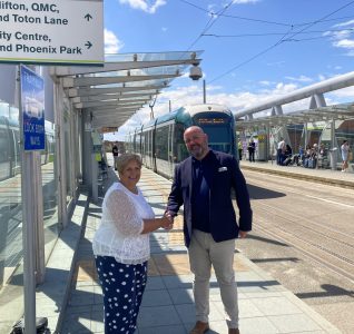 Andrew Conroy and Councillor Barnard at the NET Tram stop