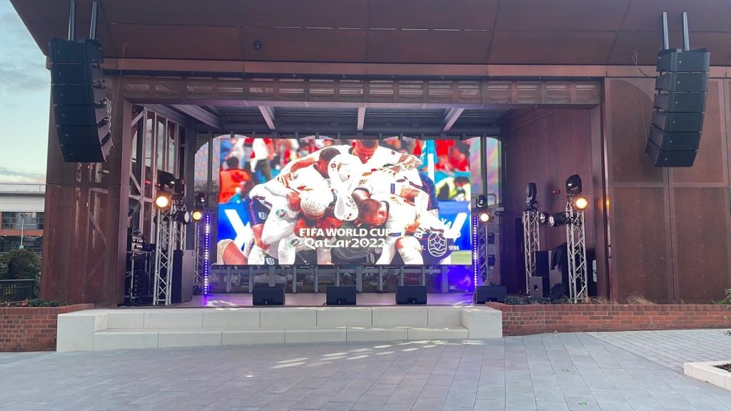 Large screen outside at Binks Yard, the new bar and restaurant in Nottingham's island quarter