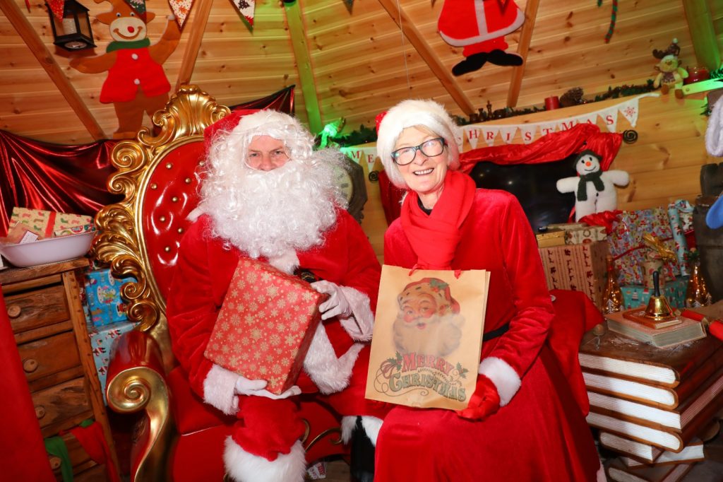 Santa and Mrs Claus in the santas grotto at the Tropical butterfly house.