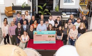 Giant novelty cheque being awarded to those on at Framework