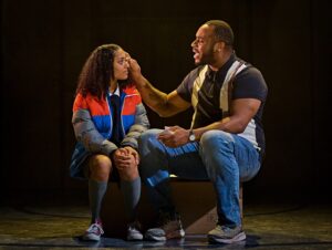 Two actors on stage on the set of an unexpected twist