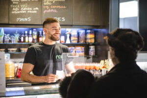 Someone serving in the NAE cafe.