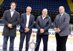 Men stood on the ice in suits