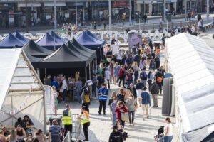areal shot of the ay up market in old market square.