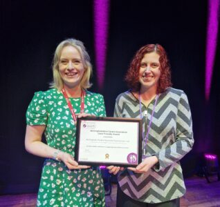Carer Friendly Award being presented to TRCH Nottingham's Emily Malen (FOH Manager) and Elizabeth Choo from the Notts Carers Association