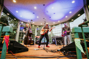 The band outsiders performing on stage