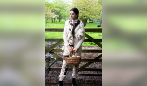 Shot of a model in a rustic set of clothes designed by an NTU student for FashAnne