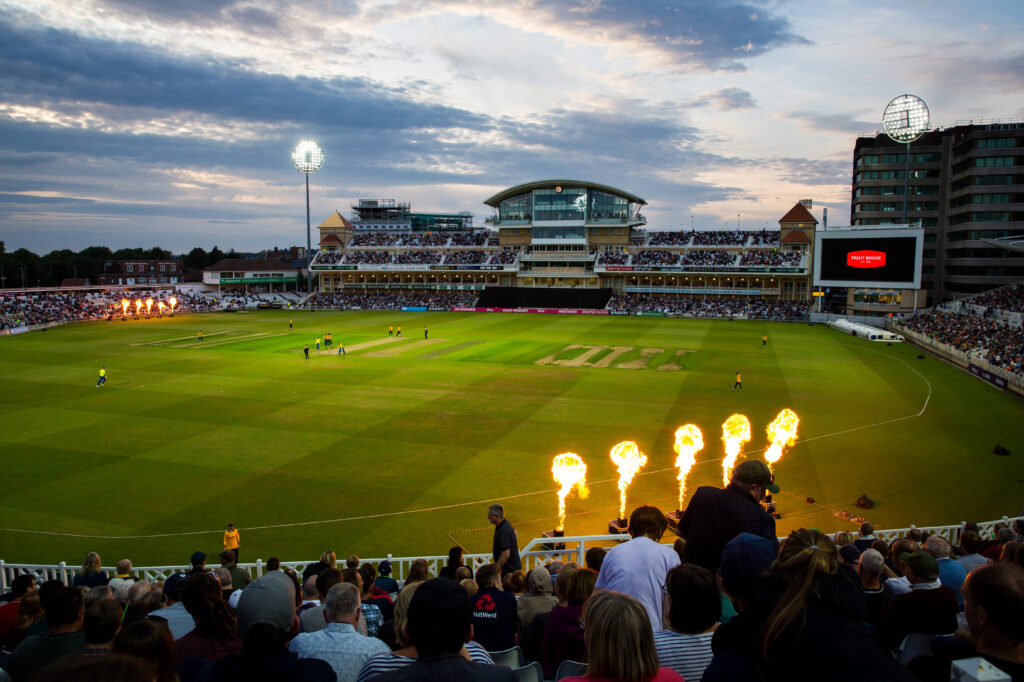 Shot of trent bridge in the evening with some flamethrowers shooting fire up into the air on the pitch