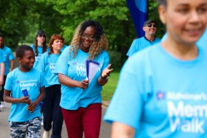 A lady with a younger family member taking part in a previous Alzheimer's walk.