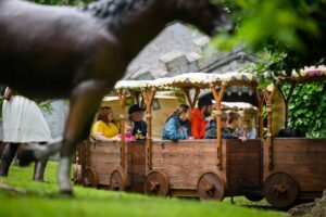 Families on a train at Sundown Adventureland