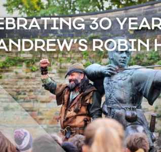 Ade Andrews in front of the Robin Hood statue.
