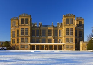 Image of Hardwick Hall in the Winter with snow on the ground.