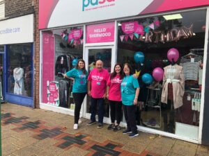 Volunteers outside of the sherwood PDSA Store.
