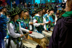 Image shows band of drummers