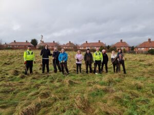 Green Hustle volunteers tree planting at Amesbury Circus, 2023