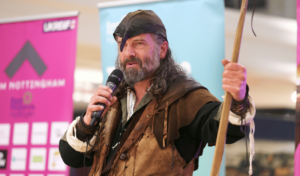 Photo of the Robin Hood Town Tour addressing the crowd at UKREiif 2024
