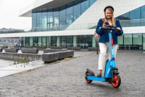 Photo of a woman on an e-scooter